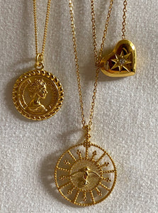 three 18 karat gold plated pendant necklaces