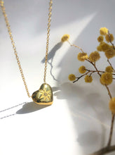 Load image into Gallery viewer, gold plated heart-shaped pendant necklace with cubic zirconia stone in the middle
